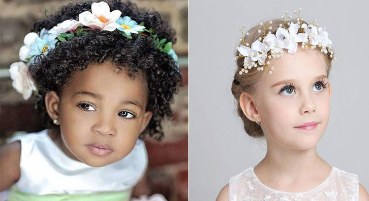 Duas crianças com penteados com coroa de flor